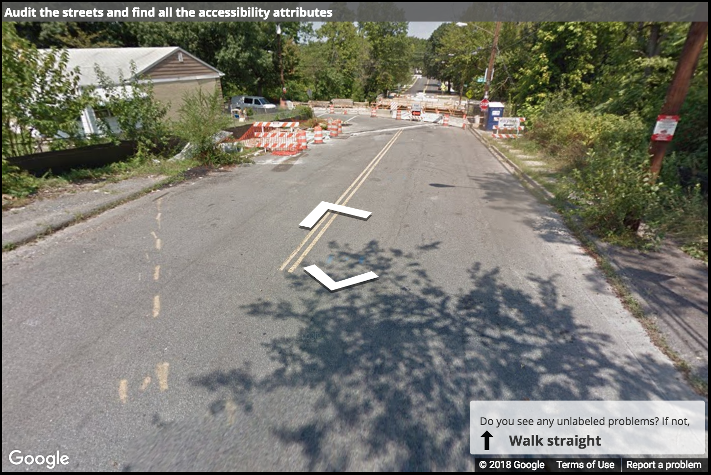 An earlier snapshot of a location with construction. A Street View image of a road with construction